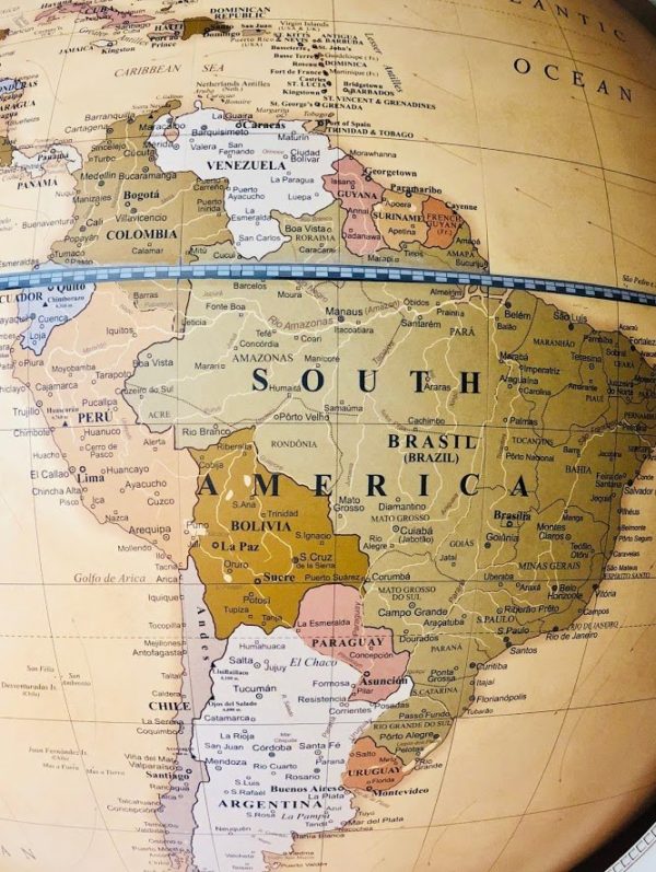 Close-up photo of South America on world map of the Versus extra large contemporary world globe.